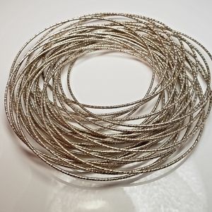Silver tone multi hoop bracelet
